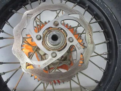 2008 KTM 65 SX 12" REAR WHEEL RIM W/ ROTOR COMPLETE, FITS 03-08, M180