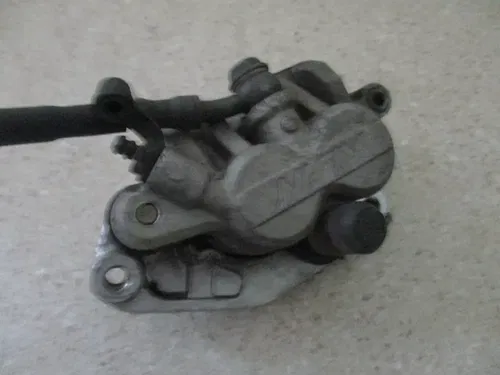 2005 KAWASAKI KX 250F FRONT BRAKE ASSEMBLY CALIPER MASTER COMPLETE, M164