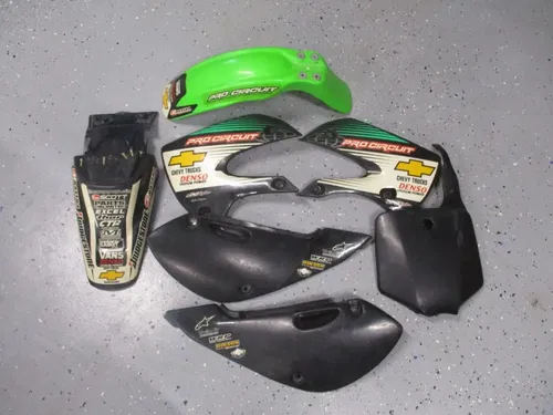 2006 KAWASAKI KLX 110 UFO BLACK PLASTICS w/ PRO CIRCUIT TEAM GRAPHICS, M229