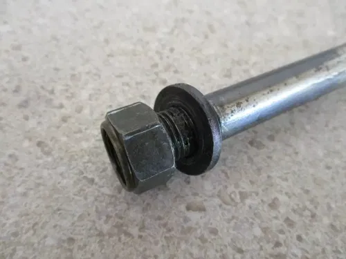2007 YAMAHA TTR125LE SWINGARM SHAFT PIVOT BOLT NUT OEM, 1B2-F2141-00-00, MX60