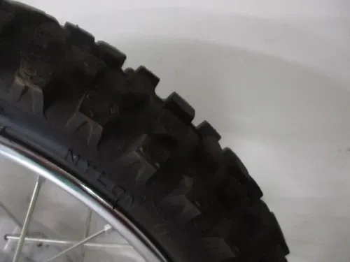 2024 HONDA CRF 110 14" FRONT WHEEL W/ TIRE FRONT RIM COMPLETE, FITS ALL, M238