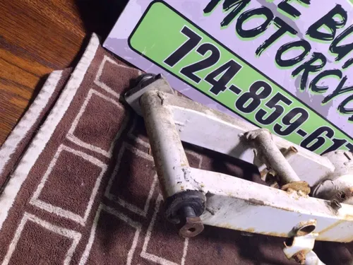 1986 SUZUKI QUADRUNNER 230 LT230E 2X4 OEM REAR SWINGARM BACK SUSPENSION CARRIER