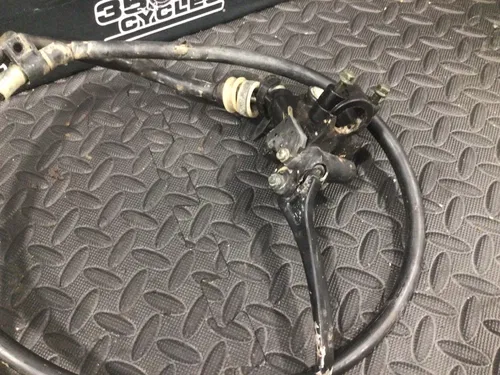 1991 Suzuki DR350 OEM FRONT BRAKE CALIPER ASSEMBLY MASTER CYLINDER LEVER