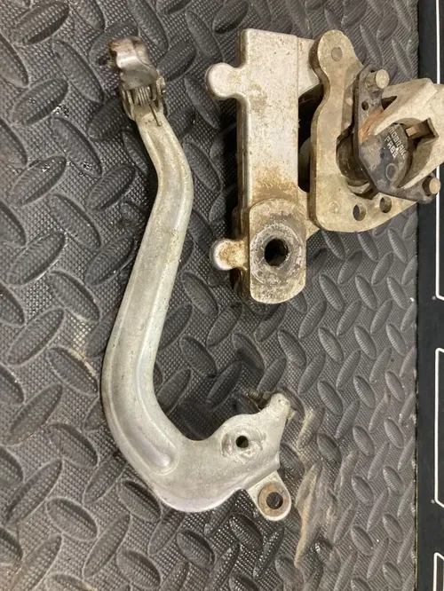 2002 02-15 RM85 RM85L OEM Rear Brake Caliper Bracket Lever