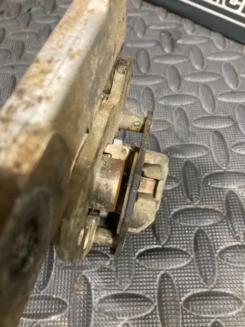 2002 02-15 RM85 RM85L OEM Rear Brake Caliper Bracket Lever