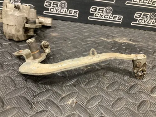 2002 02-15 RM85 RM85L OEM Rear Brake Caliper Bracket Lever