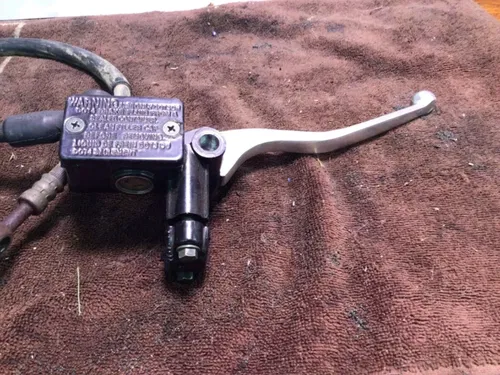 1986 SUZUKI QUADRUNNER LTF230 LTF 230 G FRONT BRAKE MASTER CYLINDER LEVER PERCH