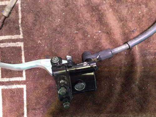 1986 SUZUKI QUADRUNNER LTF230 LTF 230 G FRONT BRAKE MASTER CYLINDER LEVER PERCH
