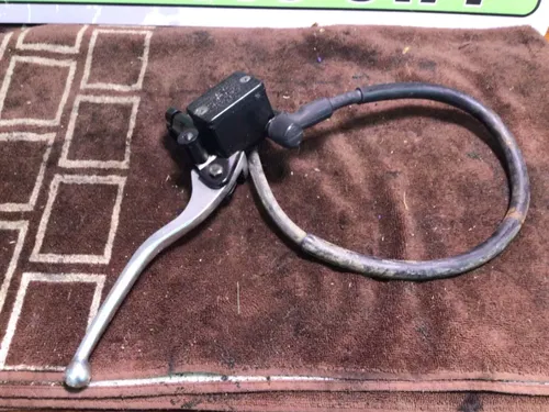 1986 SUZUKI QUADRUNNER LTF230 LTF 230 G FRONT BRAKE MASTER CYLINDER LEVER PERCH