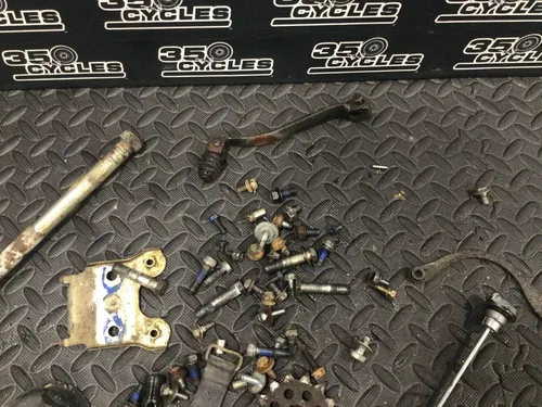 1991 Suzuki DR350 DR 350 OEM misc chassis hardware bolts dipstick shifter bolt