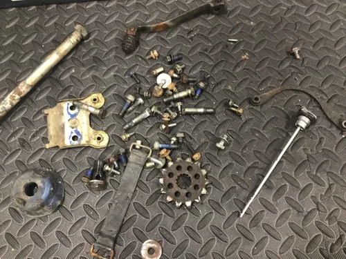 1991 Suzuki DR350 DR 350 OEM misc chassis hardware bolts dipstick shifter bolt