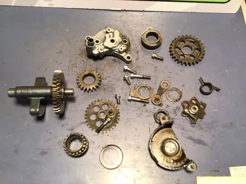 1984 Honda XL250R right side gears oil pump counter balance gear idler secondary