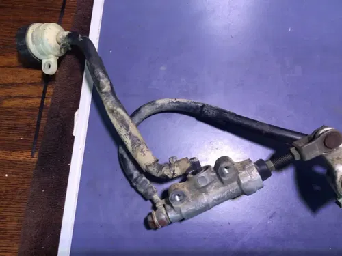 1990 89-95 RM250 RM125 OEM REAR BRAKE SYSTEM CALIPER MASTER RESERVOIR