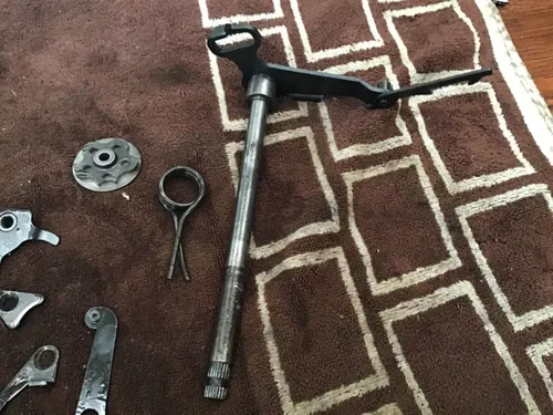 1974 Suzuki TS100 shift shaft shifting hardware gear selector spring