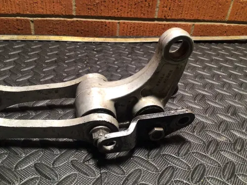1990 kawasaki kx-125, kx-250  rear shock linkage swing arm wishbone
