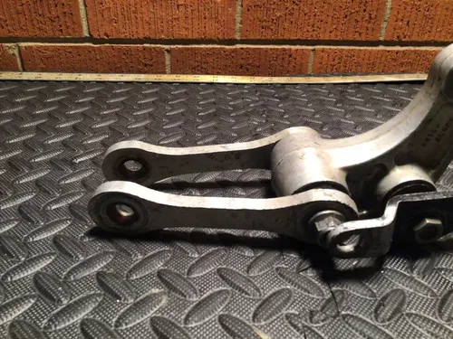 1990 kawasaki kx-125, kx-250  rear shock linkage swing arm wishbone