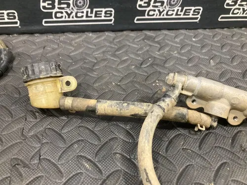 2002 02-15 RM85 RM85L OEM Rear Brake Caliper Bracket Master cylinder