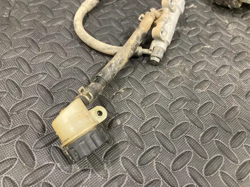 2002 02-15 RM85 RM85L OEM Rear Brake Caliper Bracket Master cylinder