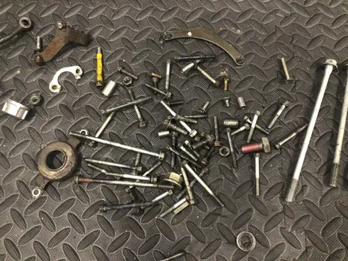1991 Suzuki DR350 DR 350 OEM misc engine hardware oil line head bolts clutch