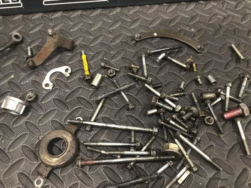 1991 Suzuki DR350 DR 350 OEM misc engine hardware oil line head bolts clutch