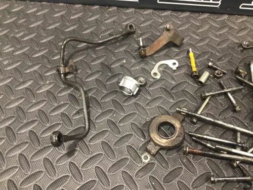 1991 Suzuki DR350 DR 350 OEM misc engine hardware oil line head bolts clutch