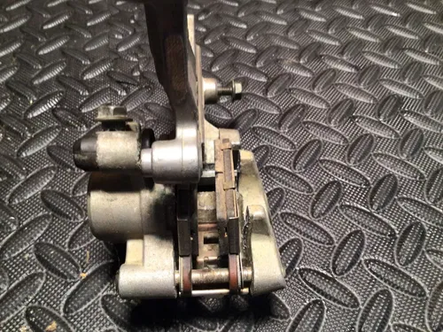 2001 SUZUKI RM125 RM250 OEM NISSIN REAR BACK BRAKE CALIPER 69100-36E40