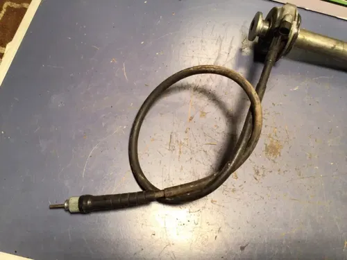 1999 Triumph Daytona 955i OEM Front Axle w/ spacers speedo gear cable