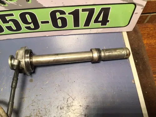 1999 Triumph Daytona 955i OEM Front Axle w/ spacers speedo gear cable