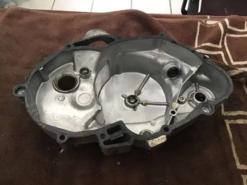1974 Suzuki TS100 clutch cover drain plug right side cover