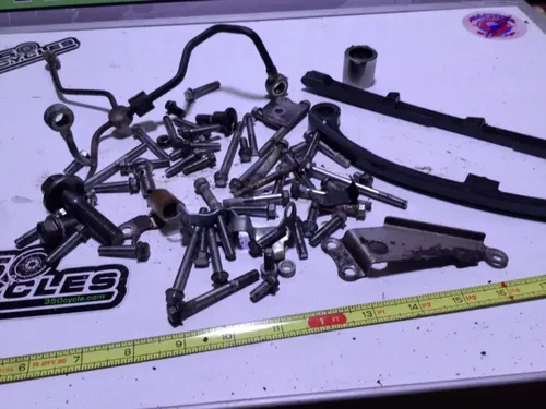 2009 Kawasaki KLX250S KLX250 misc hardware chain guides oil line bolts clutch