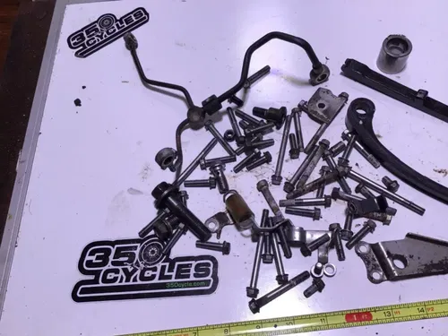 2009 Kawasaki KLX250S KLX250 misc hardware chain guides oil line bolts clutch