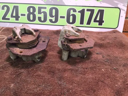 1986 SUZUKI QUADRUNNER 230 LT230E 2X4 OEM LEFT FRONT BRAKE CALIPER Calipers