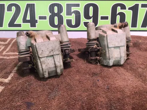 1986 SUZUKI QUADRUNNER 230 LT230E 2X4 OEM LEFT FRONT BRAKE CALIPER Calipers