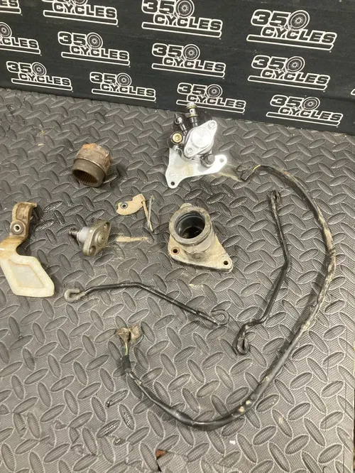 2005 HONDA 400ex TRX 400 EX intake rear caliper misc parts axle nut