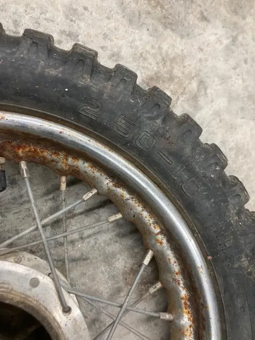 KTM SX 50 1997 10" FRONT WHEEL JR COMPLETE W/ tire rusty rim solid