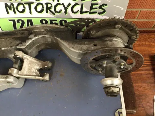 1999 TRIUMPH 955I SINGLE SIDED SWINGARM AND WHEEL DAYTONA / SPEED TRIPLE