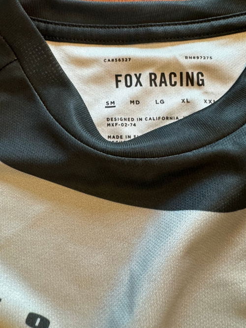 New with tags. Fox jersey/shirt size small 