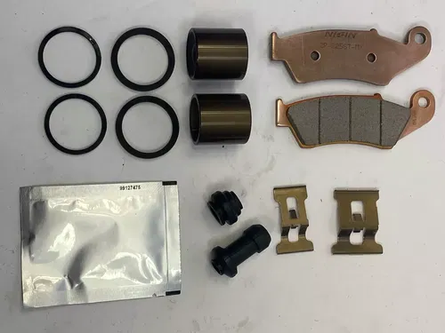 OEM Front Brake Caliper Rebuild Kit - Seal Piston Stopper Spring Nissin