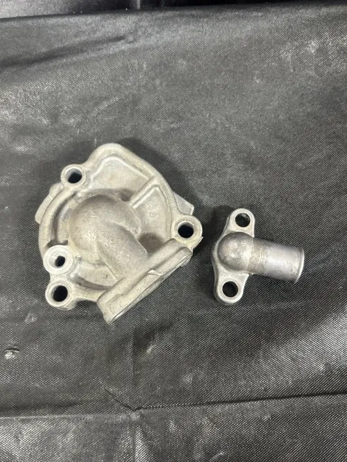 2004 Kawasaki KX65 Water Pump Cover OEM | No Cracks | Good Condition
