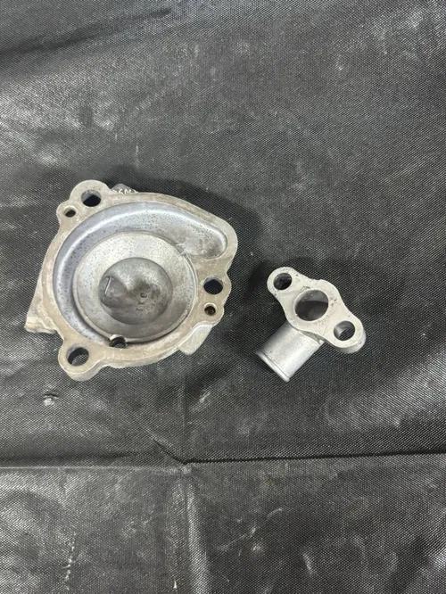 2004 Kawasaki KX65 Water Pump Cover OEM | No Cracks | Good Condition