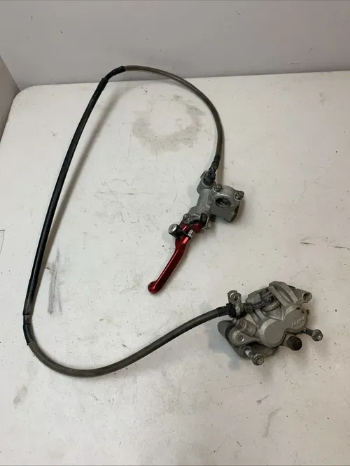 2004 02-18 CRF450R OEM FRONT BRAKE CALIPER MASTER LINE LEVER RES. 45150-MEN-006