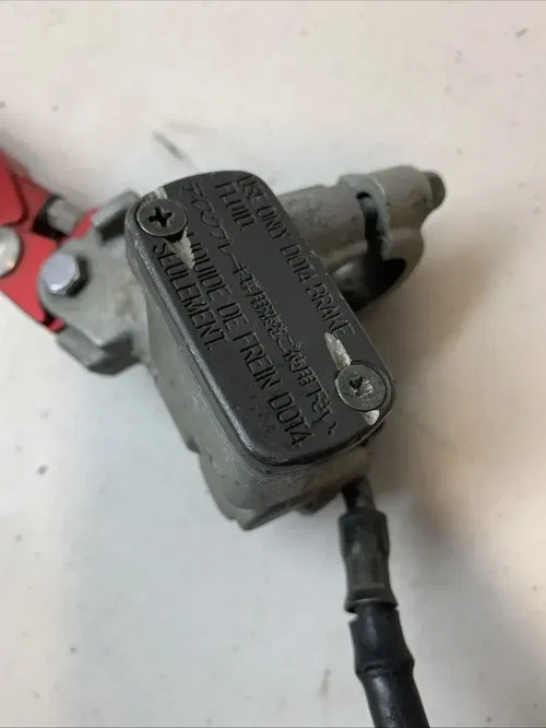 2004 02-18 CRF450R OEM FRONT BRAKE CALIPER MASTER LINE LEVER RES. 45150-MEN-006