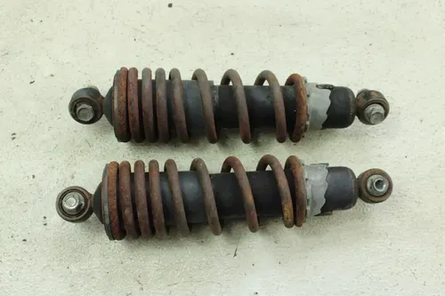 2002 Suzuki Quadrunner 250 OEM Rear Shock Pair  B4464