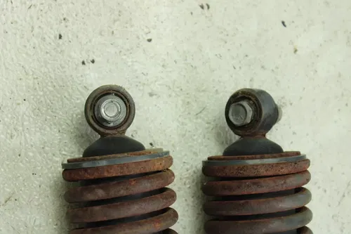 2002 Suzuki Quadrunner 250 OEM Rear Shock Pair  B4464