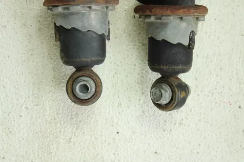 2002 Suzuki Quadrunner 250 OEM Rear Shock Pair  B4464