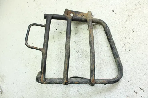 2000 Kawasaki Bayou 220 OEM Left Heel Guard  B4463
