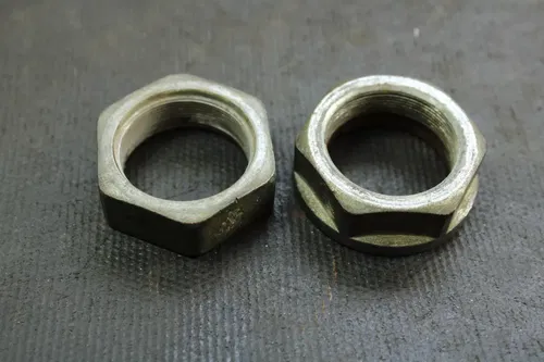 2000 Honda Recon 250 OEM Axle Locking Nut Set  B4433