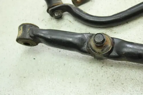 2000 Kawasaki Bayou 220 OEM Left Rear Suspension Arms  B4463