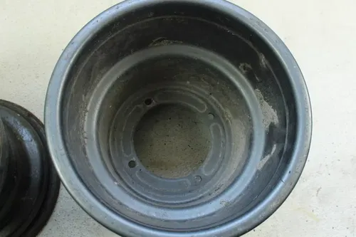 2002 Suzuki Quadrunner 250 OEM 10x9.5 Rear Wheel Set  B4464
