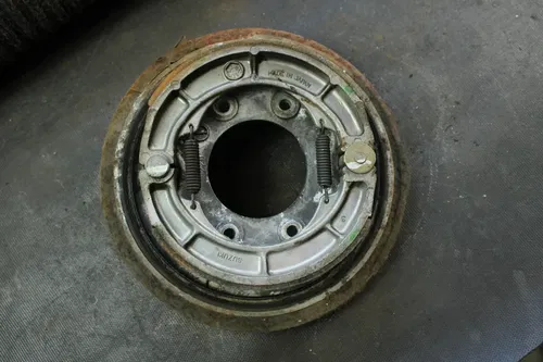 2002 Suzuki Quadrunner 250 OEM Rear Brake Drum Panel  B4464